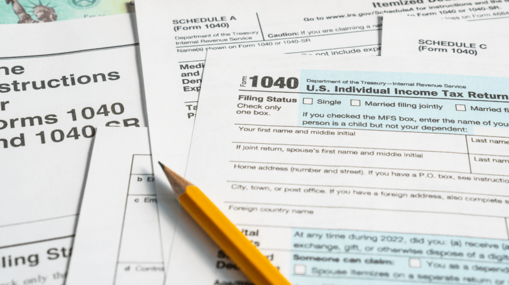 Hobby or Business: What Factors Does the IRS Consider? with paperwork and a pencil